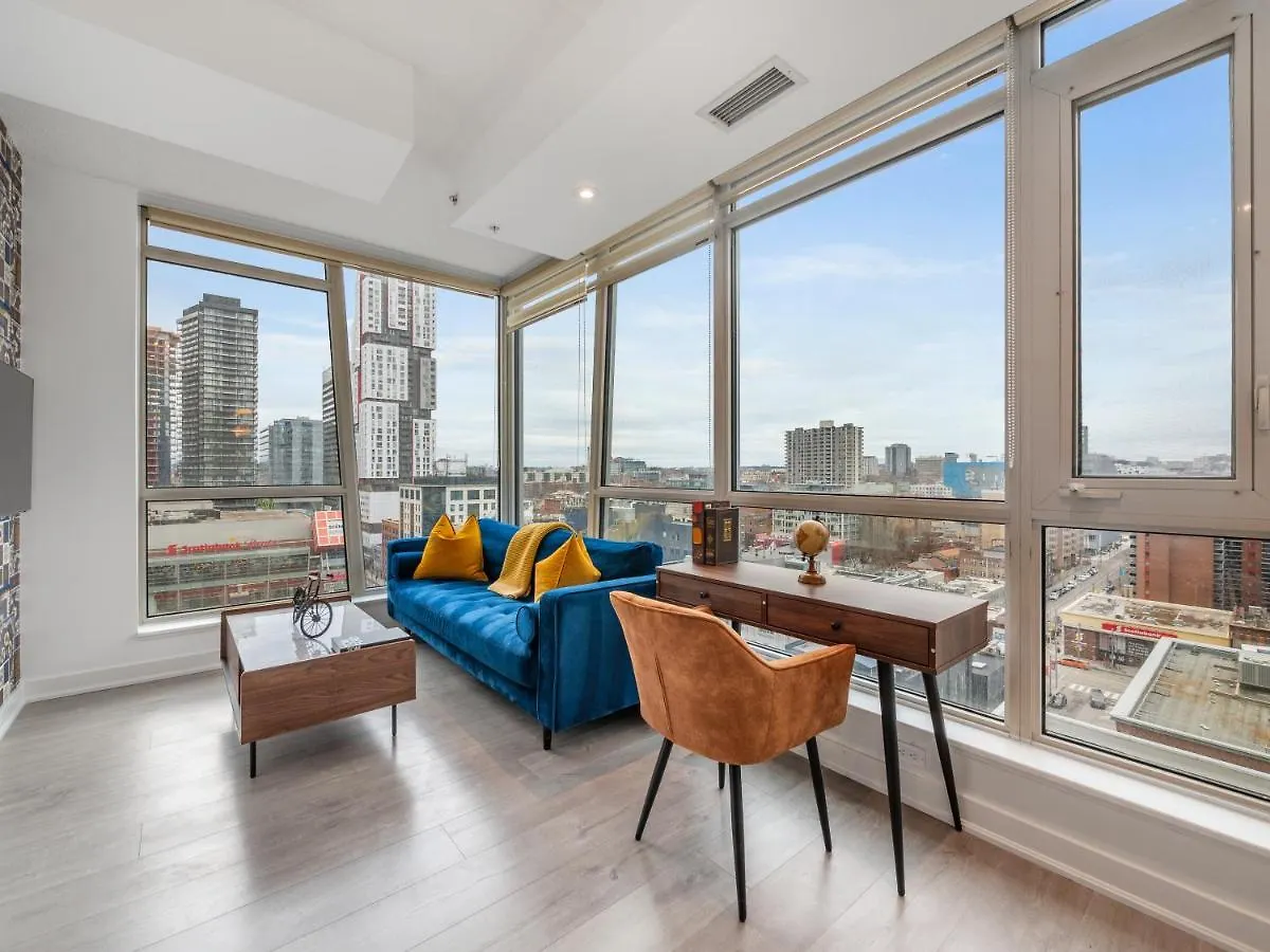 High-End 2 Bedroom Condo - Entertainment District, Downtown - City Skyline View & Balcony contacts
